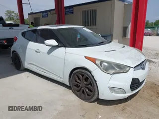 2013 Hyundai Veloster w/Black Int with VIN KMHTC6AD8DU095992, listed as a IAAI auction lot 41874404 with 250,116 mi miles and . Bid and sale history available at DreamBid. Image 1.