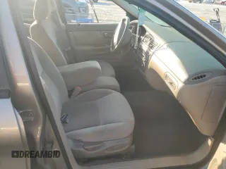 2003 Ford Taurus z VIN 1FAFP52253A170456, wystawiony jako Copart lot #70009824 z przebiegiem 216 567 mil mil oraz Szkoda całkowita • Salvage title. Historia ofert i sprzedaży dostępna na DreamBid. Obrazek 7.
