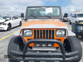 1991 Jeep Wrangler with VIN 2J4FY29SXMJ105443, listed as a IAAI auction lot 41964359 with 1,674,923 mi miles. Bid and sale history available at carsss.com. Image 6.