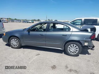 2005 Pontiac Grand Am SE with VIN 1G2NE52E25M101462, listed as a IAAI auction lot 41743136 with 77,376 mi miles. Bid and sale history available at carsss.com. Image 15.