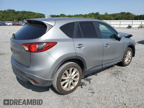 2015 Mazda CX-5 Grand Touring with VIN JM3KE4DY8F0540181, listed as a Copart auction lot 70624394 with 119,420 mi miles and Salvage Title. Bid and sale history available at carsss.com. Image 3.