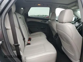 2016 Cadillac SRX Luxury Collection z VIN 3GYFNBE33GS527392, wystawiony jako Copart lot #54786465 z przebiegiem 58 327 mil mil oraz Czysty tytuł • Clean title. Historia ofert i sprzedaży dostępna na DreamBid. Obrazek 11.