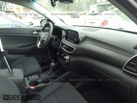 2019 Hyundai Tucson Ultimate with VIN KM8J3CAL1KU899836, listed as a IAAI auction lot 29776928 with 12,055 mi miles. Bid and sale history available at carsss.com. Image 5.
