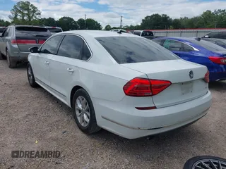 2016 Volkswagen Passat S with VIN 1VWAT7A32GC031172, listed as a IAAI auction lot 42231645 with 112,974 mi miles and . Bid and sale history available at DreamBid. Image 3.