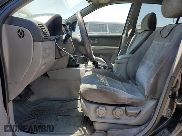 2006 Kia Sorento LX with VIN KNDJD733365525072, listed as a Copart auction lot 60260835 with 128,572 mi miles and Salvage title. Bid and sale history available at DreamBid. Image 7.