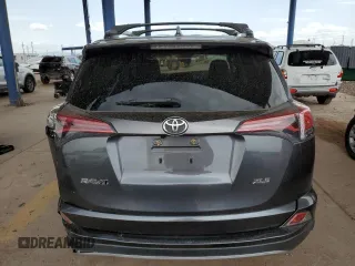 2018 Toyota RAV4 XLE with VIN JTMWFREV9JD131259, listed as a Copart auction lot 64748645 with 93,116 mi miles and Salvage title. Bid and sale history available at DreamBid. Image 6.