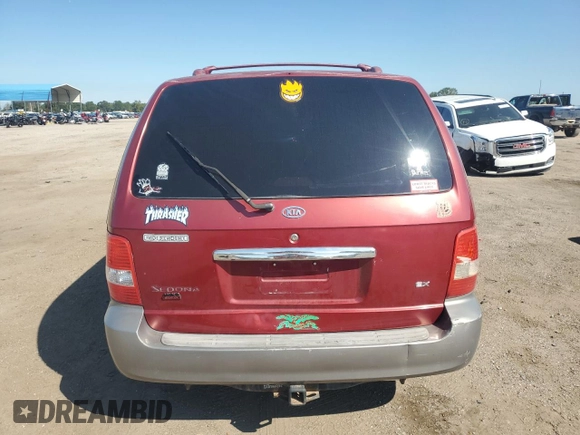 2003 Kia Sedona LX with VIN KNDUP131236411909, listed as a Copart auction lot 73715384 with 179,642 mi miles and Salvage Title. Bid and sale history available at carsss.com. Image 6.