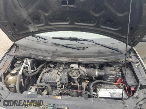 2006 Ford Freestar SE z VIN 2FMDA51616BA33106, wystawiony jako Copart lot #44608165 z przebiegiem 89 713 mil mil oraz Szkoda całkowita • Salvage title. Historia ofert i sprzedaży dostępna na DreamBid. Obrazek 14.