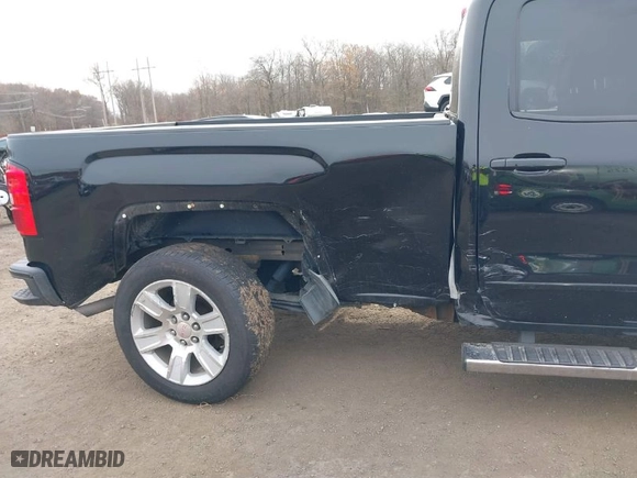 2016 GMC Sierra 1500 with VIN 1GTV2LEH9GZ421642, listed as a IAAI auction lot 40870826 with 105,326 mi miles. Bid and sale history available at carsss.com. Image 6.