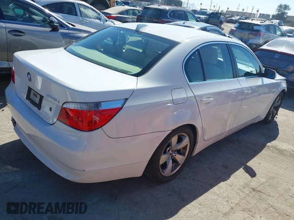 2005 BMW 5 Series 525i with VIN WBANA53565B859447, listed as a IAAI auction lot 41663950 with 99,064 mi miles. Bid and sale history available at carsss.com. Image 4.