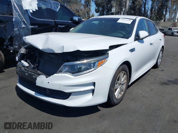 2016 Kia Optima LX with VIN 5XXGT4L37GG121295, listed as a IAAI auction lot 41922348 with 82,238 mi miles. Bid and sale history available at carsss.com. Image 2.