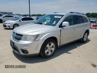 2012 Dodge Journey SXT with VIN 3C4PDCBG1CT134375, listed as a Copart auction lot 61059305 with 165,913 mi miles and Salvage title. Bid and sale history available at DreamBid. Image 1.