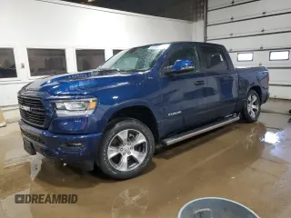 2023 Ram 1500 Laramie with VIN 1C6SRFJT0PN655533, listed as a Copart auction lot 56519305 with 16,134 mi miles and Salvage title. Bid and sale history available at DreamBid. Image 1.