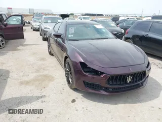 2019 Maserati Ghibli z VIN ZAM57YSL8K1312731, wystawiony jako IAAI lot #42240495 z przebiegiem 31 822 mil mil oraz . Historia ofert i sprzedaży dostępna na DreamBid. Obrazek 1.
