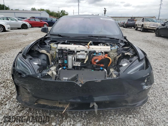 2023 Tesla Model S Plaid with VIN 5YJSA1E67PF511354, listed as a Copart auction lot 56648975 with 69,002 mi miles and Salvage title. Bid and sale history available at DreamBid. Image 5.