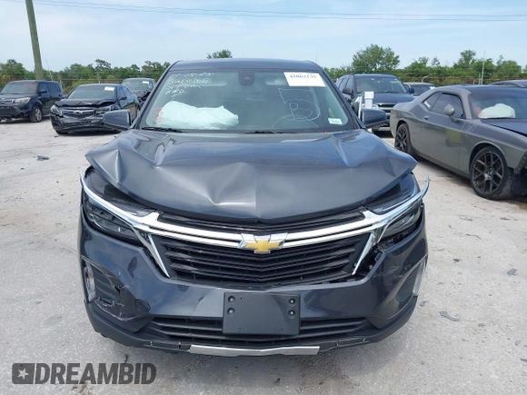 2022 Chevrolet Equinox LT z VIN 2GNAXUEVXN6145063, wystawiony jako IAAI lot #42062135 z przebiegiem 51 176 mil mil oraz . Historia ofert i sprzedaży dostępna na DreamBid. Obrazek 12.