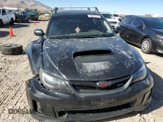 2014 Subaru WRX WRX z VIN JF1GR7E69EG210997, wystawiony jako Copart lot #76611214 z przebiegiem 155 042 mil mil oraz Szkoda całkowita • Salvage title. Historia ofert i sprzedaży dostępna na DreamBid. Obrazek 5.