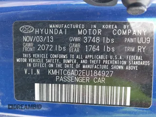 2014 Hyundai Veloster with VIN KMHTC6AD2EU184927, listed as a IAAI auction lot 42133499 with 103,499 mi miles. Bid and sale history available at carsss.com. Image 9.