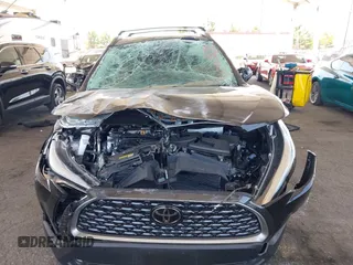 2023 Toyota Corolla Cross XLE with VIN 7MUDAAAG8PV072030, listed as a IAAI auction lot 42397573 with 6,584 mi miles and . Bid and sale history available at DreamBid. Image 11.