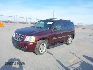2006 GMC Envoy SLE z VIN 1GKDT13S762328884, wystawiony jako IAAI lot #41778198 z przebiegiem Nie podano mil oraz . Historia ofert i sprzedaży dostępna na DreamBid. Obrazek 2.
