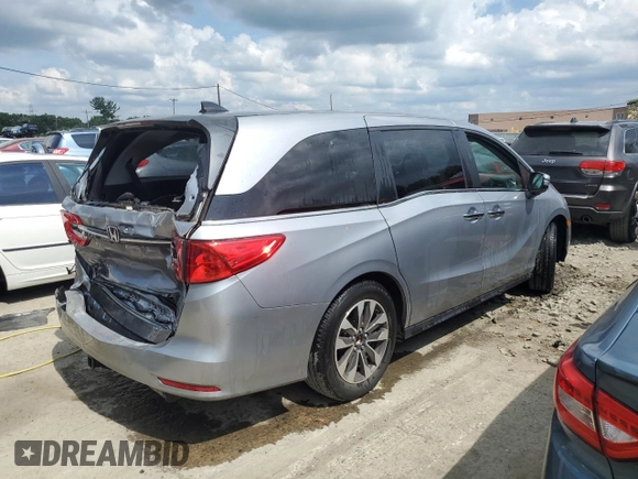 2021 Honda Odyssey EX-L with VIN 5FNRL6H79MB044718, listed as a Copart auction lot 65351134 with 28,888 mi miles and Salvage Title. Bid and sale history available at DreamBid. Image 3.