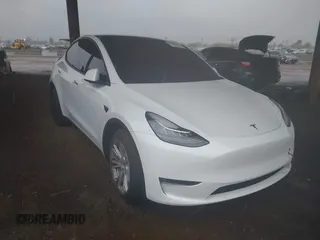 2022 Tesla Model Y Long Range z VIN 7SAYGDEE0NF451371, wystawiony jako IAAI lot #41793363 z przebiegiem Nie podano mil oraz . Historia ofert i sprzedaży dostępna na DreamBid. Obrazek 1.