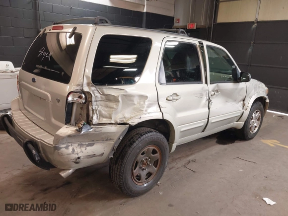 2005 Ford Escape Limited with VIN 1FMYU94195KB62327, listed as a IAAI auction lot 41910709 with 116,086 mi miles. Bid and sale history available at carsss.com. Image 4.