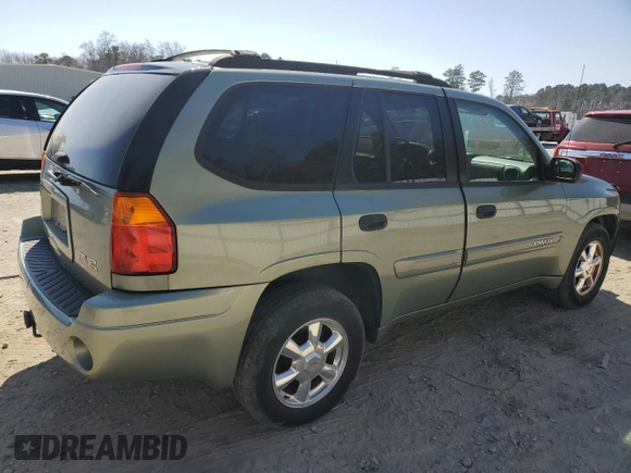 2004 GMC Envoy SLE with VIN 1GKDS13S542324252, listed as a Copart auction lot 48667895 with 206,206 mi miles and Salvage Title. Bid and sale history available at carsss.com. Image 3.