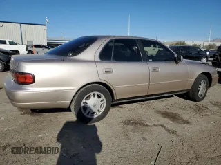 1994 Toyota Camry XLE with VIN JT2GK13E0R0017831, listed as a Copart auction lot 49887485 with 143,303 mi miles and Salvage Title. Bid and sale history available at carsss.com. Image 3.