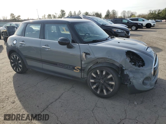 2018 MINI Hardtop 4 Door Cooper S с VIN WMWXU3C58J2F50385, выставлен на аукционе Copart как лот 51168775 с пробегом 77 091 миль миль и Списание • Salvage title. История ставок и продаж доступна на DreamBid. Изображение 4.