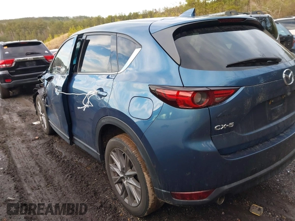 2020 Mazda CX-5 Grand Touring with VIN JM3KFADM4L0827733, listed as a IAAI auction lot 41482517 with 43,597 mi miles. Bid and sale history available at carsss.com. Image 3.