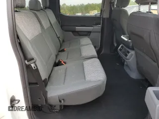 2023 Ford F-150 Lightning Pro z VIN 1FTVW1ELXPWG63466, wystawiony jako Copart lot #43397005 z przebiegiem 8 852 mil mil oraz Szkoda całkowita • Salvage title. Historia ofert i sprzedaży dostępna na DreamBid. Obrazek 10.
