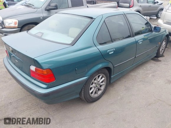 1998 BMW 3 Series 318iA with VIN WBACC0320WEK26338, listed as a IAAI auction lot 41187823 with 145,250 mi miles. Bid and sale history available at carsss.com. Image 4.