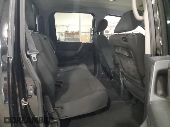 2013 Nissan Titan Pro-4X с VIN 1N6AA0EC2DN311987, выставлен на аукционе Copart как лот 50187565 с пробегом 158 838 миль миль и Списание • Salvage title. История ставок и продаж доступна на DreamBid. Изображение 10.