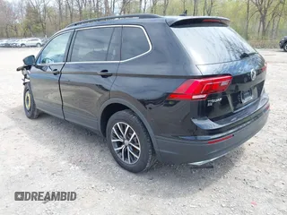 2019 Volkswagen Tiguan SE with VIN 3VV2B7AX7KM174382, listed as a IAAI auction lot 42147584 with 64,460 mi miles and . Bid and sale history available at DreamBid. Image 3.