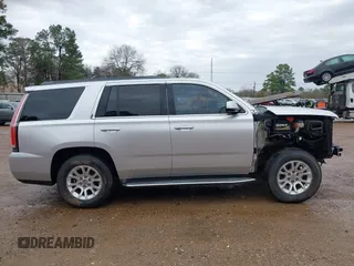 2015 GMC Yukon SLT with VIN 1GKS1BKC7FR628736, listed as a IAAI auction lot 41709926 with 130,254 mi miles. Bid and sale history available at carsss.com. Image 14.