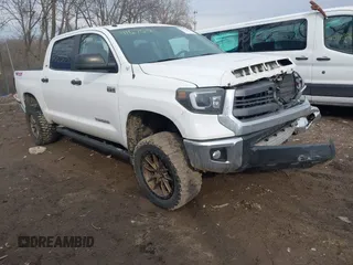 2014 Toyota Tundra 4WD Truck SR5 with VIN 5TFDW5F11EX383460, listed as a IAAI auction lot 41675181 with 148,115 mi miles. Bid and sale history available at carsss.com. Image 1.