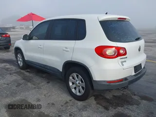 2010 Volkswagen Tiguan SEL with VIN WVGBV7AX6AW521541, listed as a IAAI auction lot 41936952 with 124,499 mi miles and . Bid and sale history available at DreamBid. Image 3.