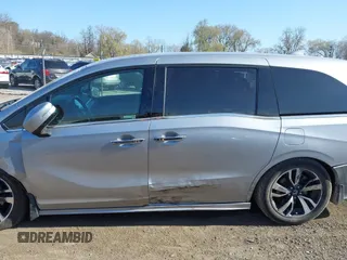 2018 Honda Odyssey Elite z VIN 5FNRL6H91JB070355, wystawiony jako IAAI lot #41975916 z przebiegiem 147 022 mil mil oraz . Historia ofert i sprzedaży dostępna na DreamBid. Obrazek 15.