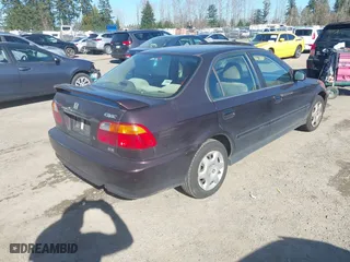 2000 Honda Civic EX with VIN 1HGEJ8649YL034008, listed as a IAAI auction lot 41691792 with 196,593 mi miles. Bid and sale history available at carsss.com. Image 4.