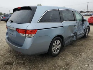 2014 Honda Odyssey EX-L with VIN 5FNRL5H68EB103941, listed as a Copart auction lot 60715095 with 109,013 mi miles and Salvage title. Bid and sale history available at DreamBid. Image 3.