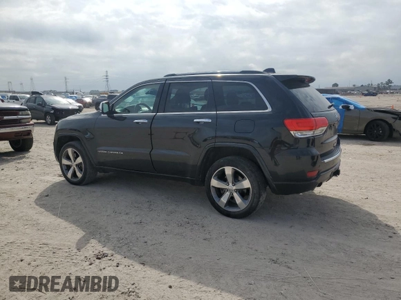 2015 Jeep Grand Cherokee Overland with VIN 1C4RJFCT6FC628729, listed as a Copart auction lot 44979155 with 105,959 mi miles and Salvage Title. Bid and sale history available at DreamBid. Image 2.