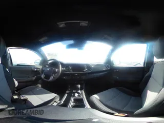 2022 Toyota Tacoma SR5 z VIN 3TMBZ5DN3NM034388, wystawiony jako IAAI lot #42270543 z przebiegiem 179 904 mil mil oraz . Historia ofert i sprzedaży dostępna na DreamBid. Obrazek 18.