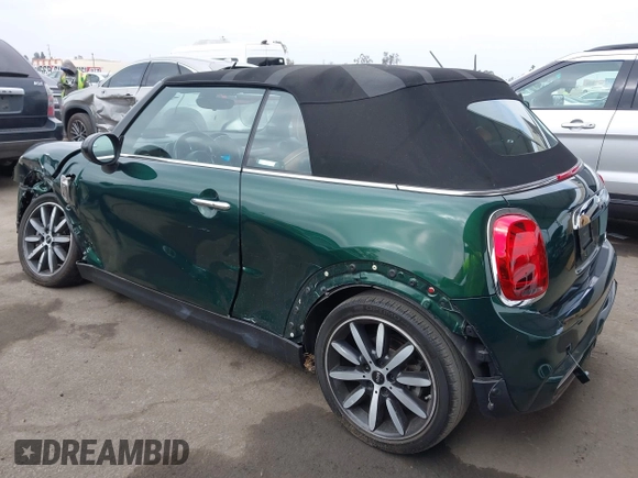2019 MINI Convertible Cooper S z VIN WMWWG9C5XK3E40620, wystawiony jako IAAI lot #42379122 z przebiegiem 5 496 mil mil oraz . Historia ofert i sprzedaży dostępna na DreamBid. Obrazek 3.