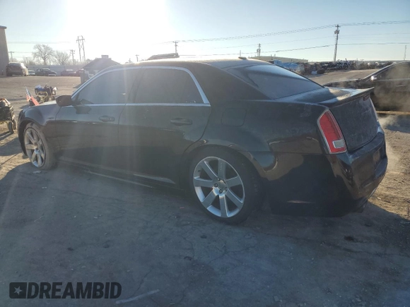 2012 Chrysler 300 SRT8 with VIN 2C3CCAFJ0CH800893, listed as a Copart auction lot 88352515 with 143,381 mi miles and Salvage Title. Bid and sale history available at carsss.com. Image 2.