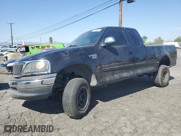 2000 Ford F-150 XL with VIN 1FTRX17W7YKB44552, listed as a Copart auction lot 72790504 with 0 mi miles and Salvage Title. Bid and sale history available at carsss.com. Image 1.