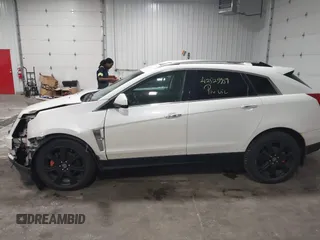 2012 Cadillac SRX Premium Collection with VIN 3GYFNFE39CS561614, listed as a IAAI auction lot 42529959 with 59,088 mi miles and . Bid and sale history available at DreamBid. Image 14.