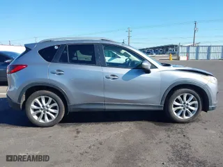 2014 Mazda CX-5 Grand Touring with VIN JM3KE2DY9E0323497, listed as a IAAI auction lot 41678360 with 216,795 mi miles. Bid and sale history available at carsss.com. Image 13.