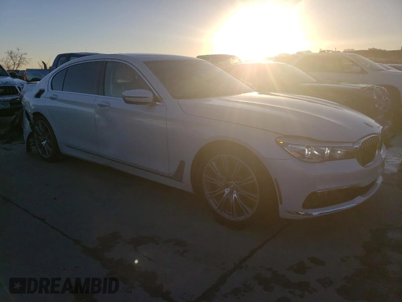 2018 BMW 7 Series 740i with VIN WBA7E2C51JG741931, listed as a Copart auction lot 76929173 with 63,169 mi miles. Bid and sale history available at carsss.com. Image 4.