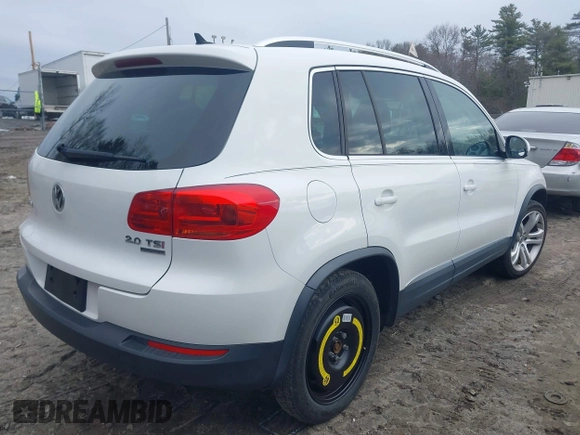 2012 Volkswagen Tiguan S with VIN WVGBV7AX0CW543697, listed as a IAAI auction lot 41853077 with 113,002 mi miles and . Bid and sale history available at DreamBid. Image 4.